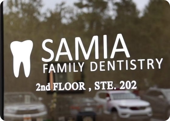 Samia Family Dentistry sign on outside of door