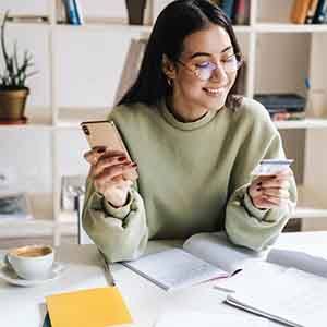 Woman holding a credit card