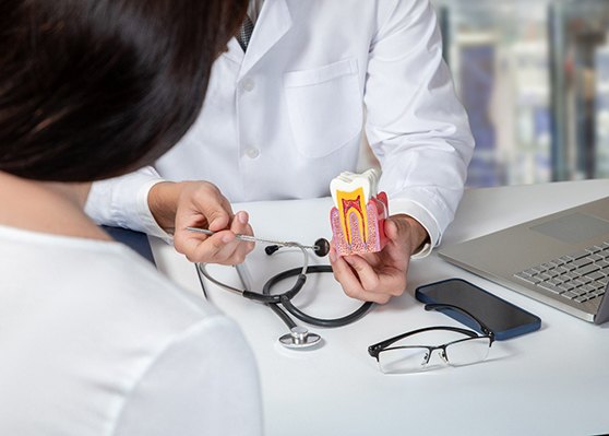 Dentist discussing treatments with patient