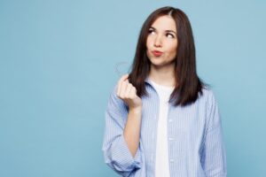 Woman wondering if she can get clear aligners with her bruxism